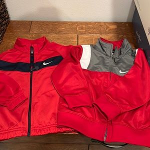 Nike jackets, one 24 mo, the other 2T
